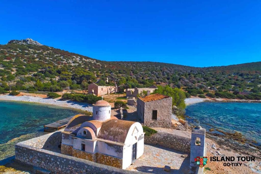 Historic chapel and coastline on Alimia Island, featured in Alimia Island Tours across the Aegean.