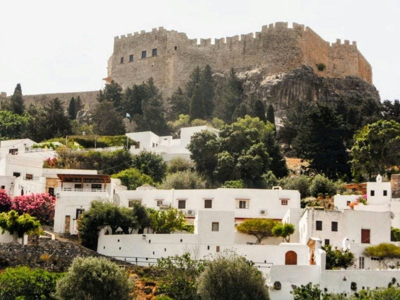 Acropolis of Lindos overlooking the whitewashed village during Lindos tours.