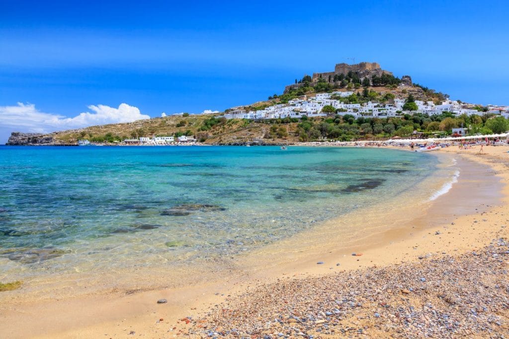 Lindos Beach and Acropolis during September in Rhodes.