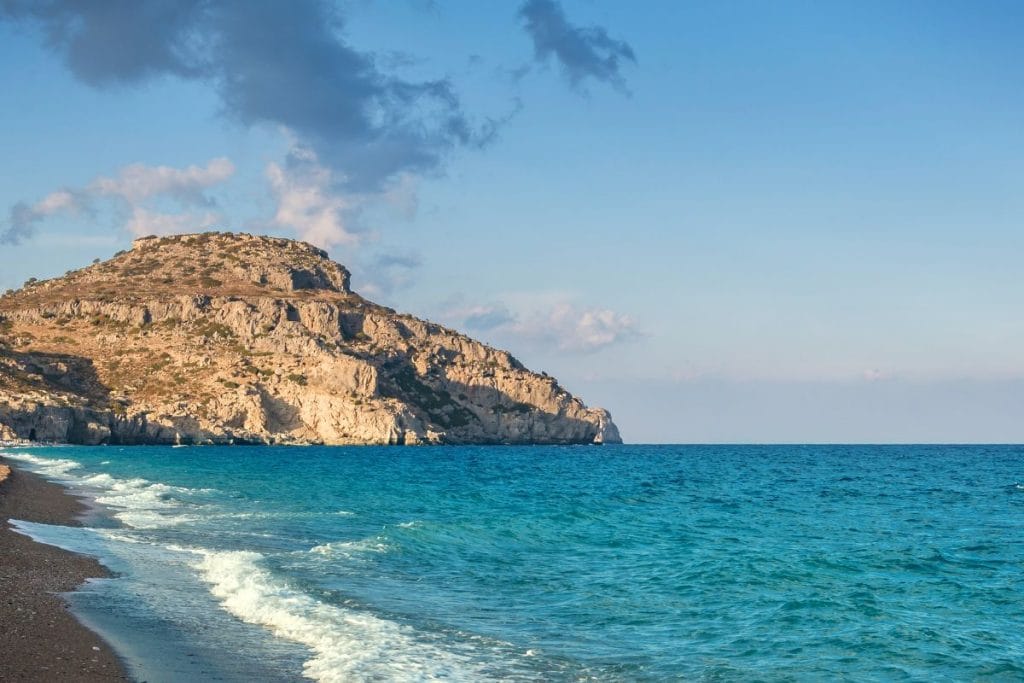 Lindos coastline and Acropolis visited on popular tours in Rhodes.