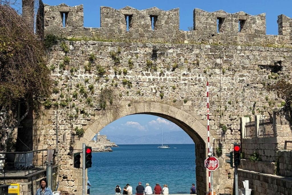 Medieval gate in Rhodes Old Town representing religious culture in Rhodes.