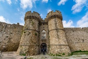 Medieval stone gate and fortifications in Rhodes, highlighting unique experiences in Rhodes.